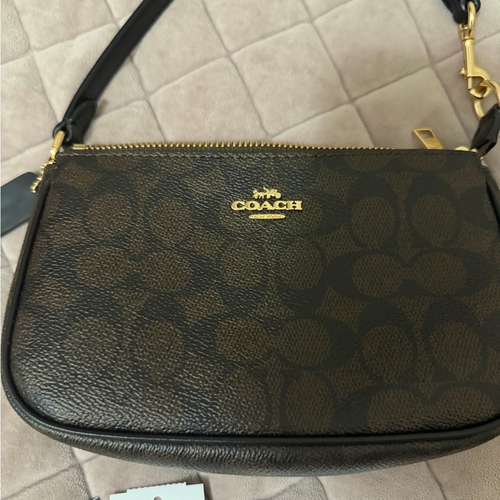 Coach Signature Canvas Nolita 19 purse